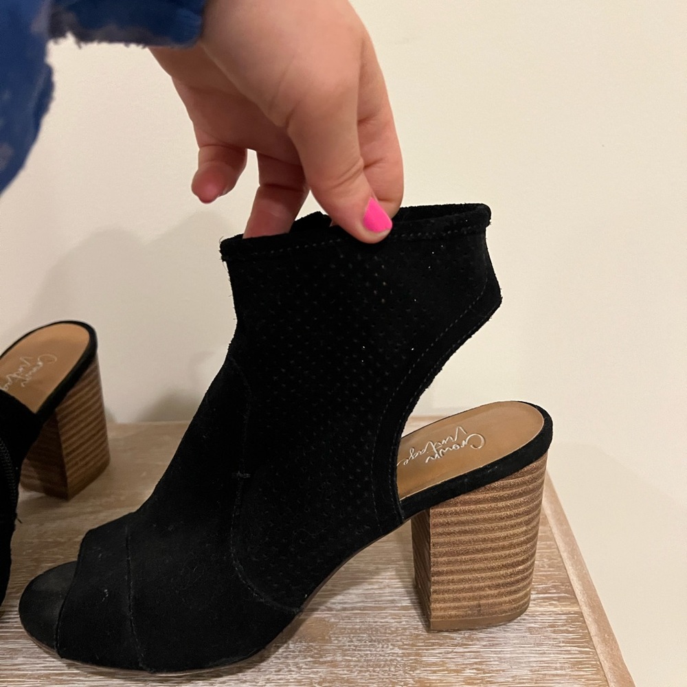 Backless/open toes booties. I am moving abroad and downsizing closet!